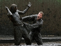 Renaissance Festival PIM 020  JOEL NEWLON and TOM ZADOYKO act in a play inside a mud pit during the 2004 Renaissance Festival in Tampa, Florida. ©PhotosinMotion.net. : WRESTLING, JOEL NEWLON, TOM ZADOYKO, renaissance festival photos in Tampa, Tampa, Florida renaissance festival, PhotosinMotion.net